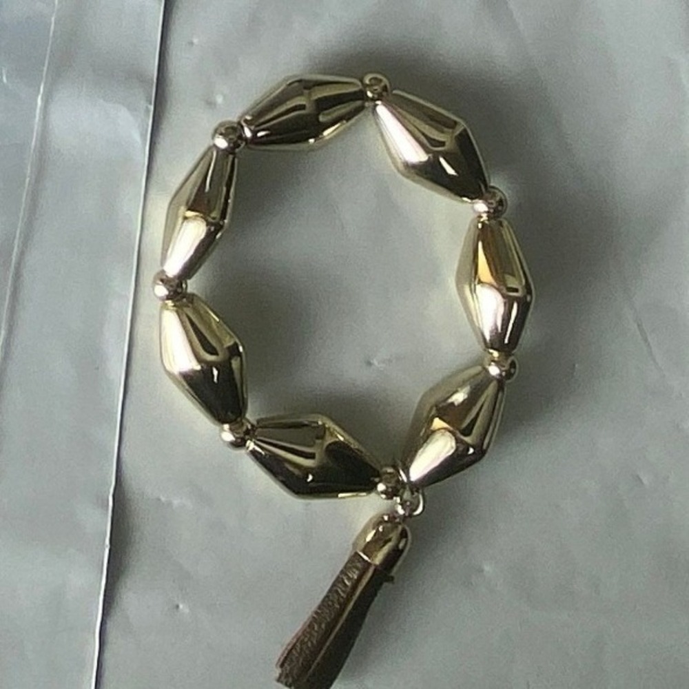 Gold Tone Geometric Bead Stretchy Bracelet Tassel Accent